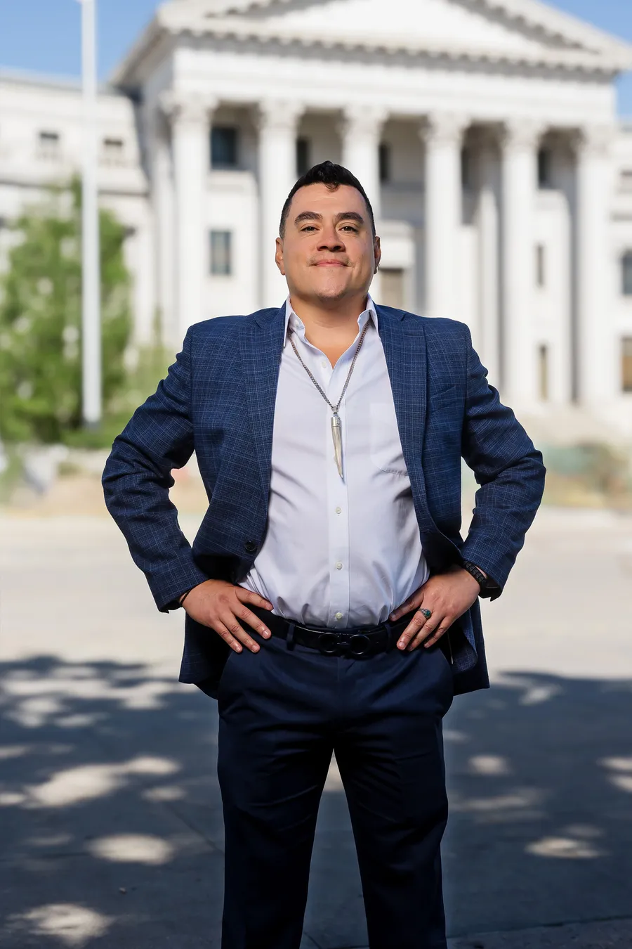 Alfredo Reyes in front of the Denver City & County Building